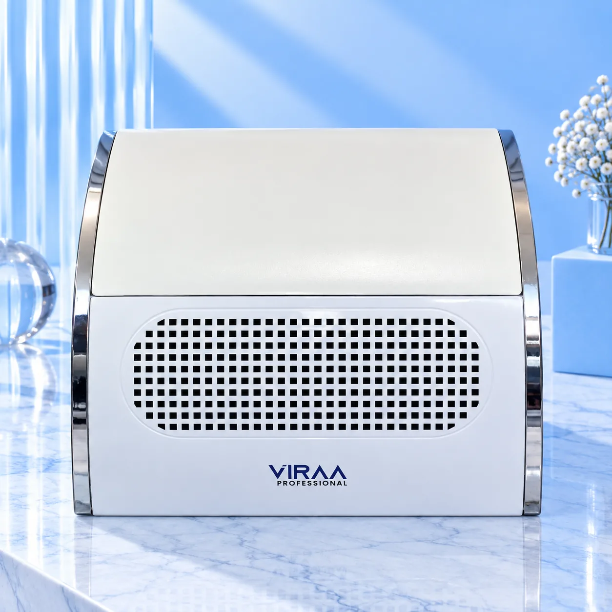 The 2-in-1 hand rest and dust collector from the front, with the filter grille inside its chrome frame