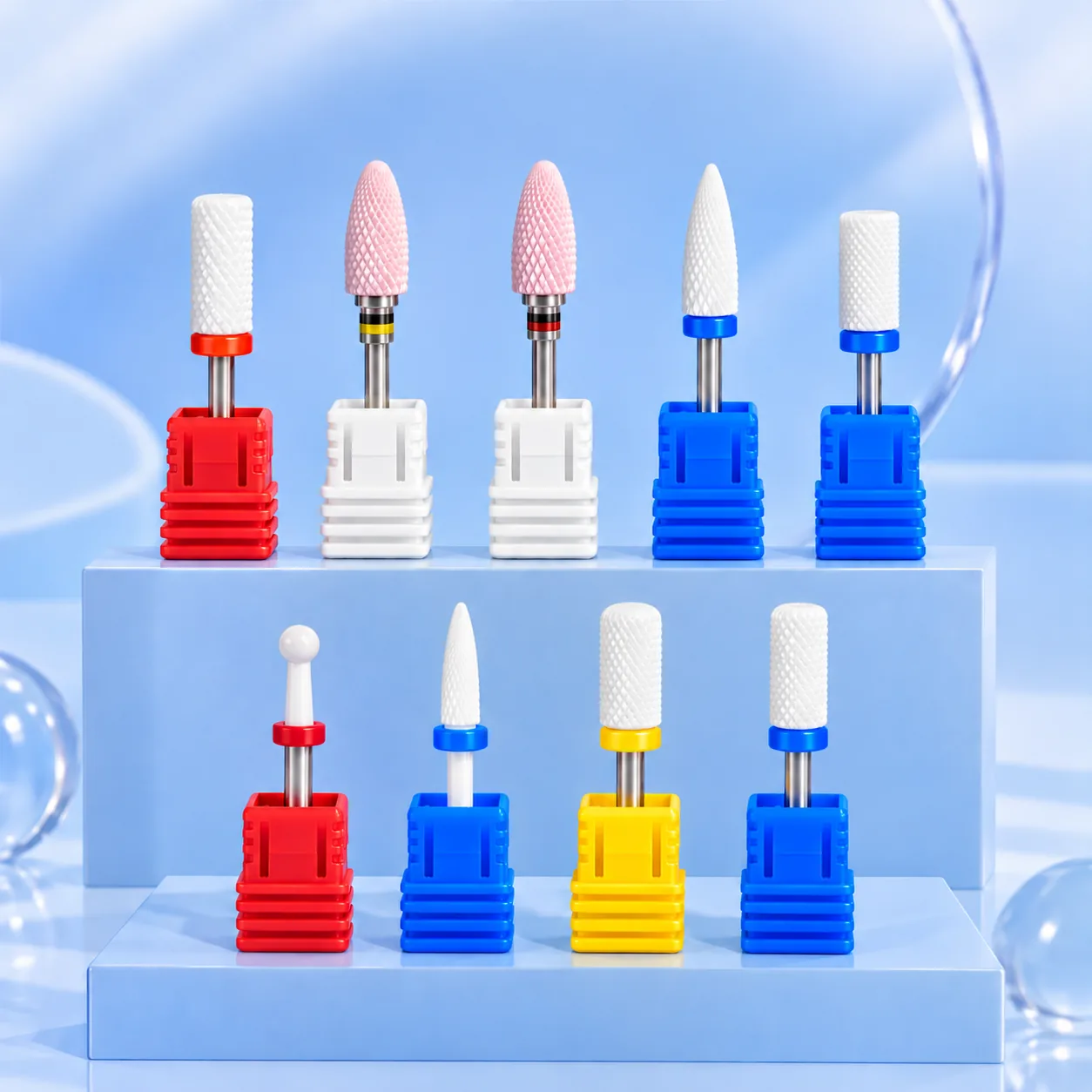 All nine Viraa Pro nail drill bits standing in their colour-coded holders on a display step