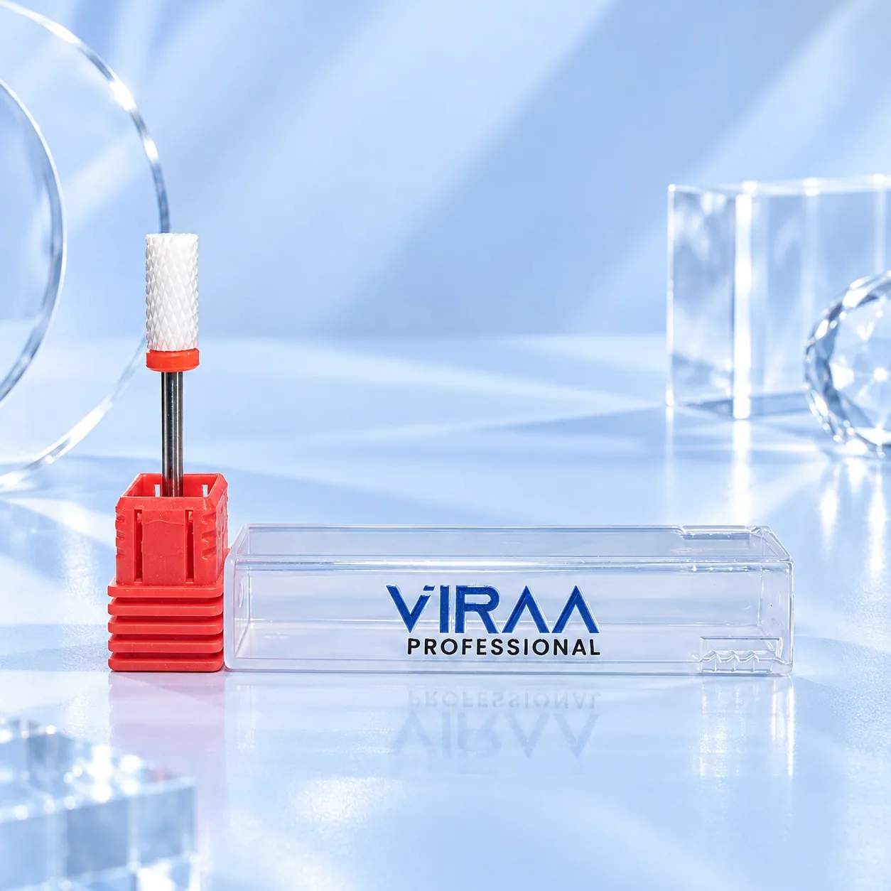 Viraa Pro nail drill bit, large barrel with a red grit band, beside its clear case
