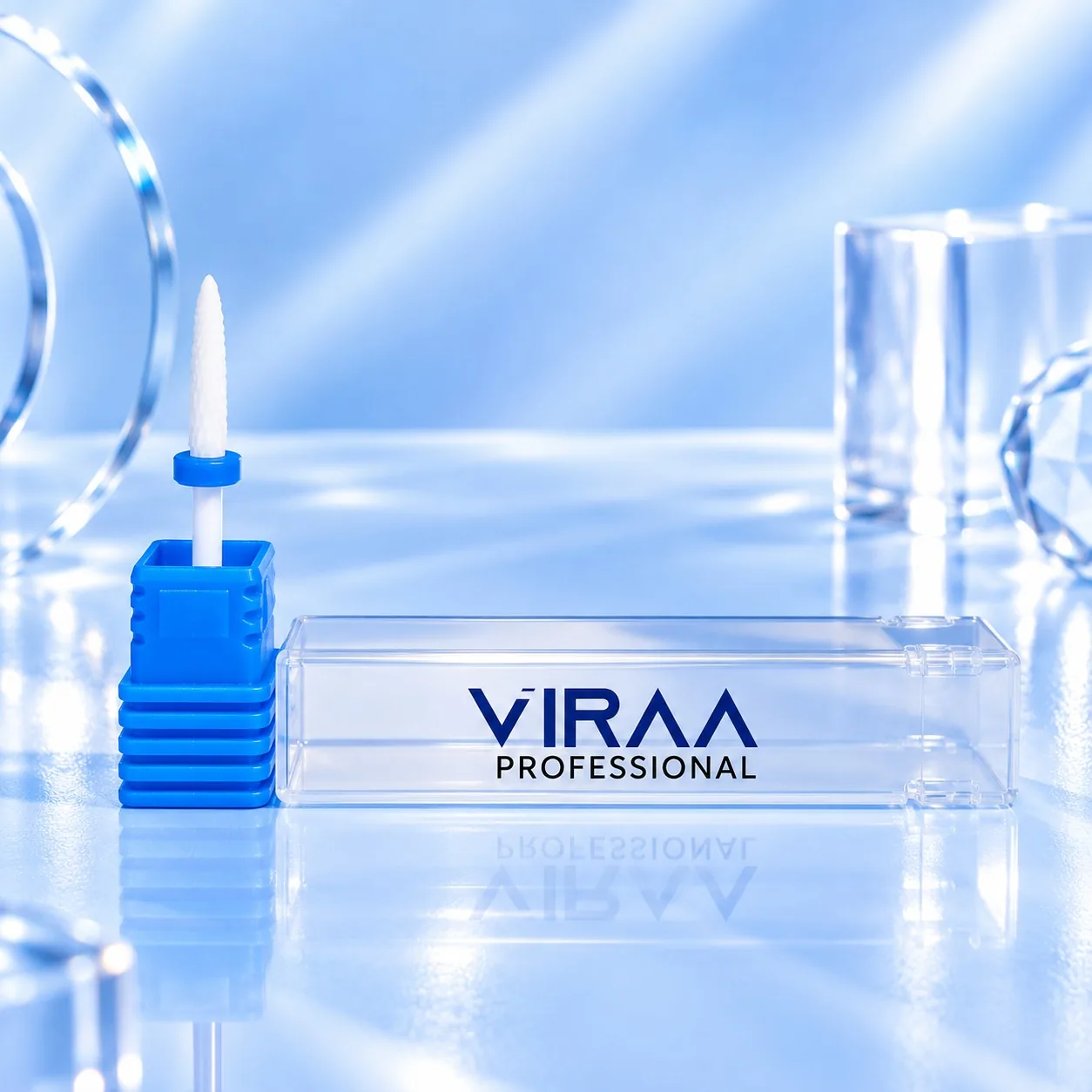 Viraa Pro nail drill bit, small flame shape with a blue grit band, beside its clear case
