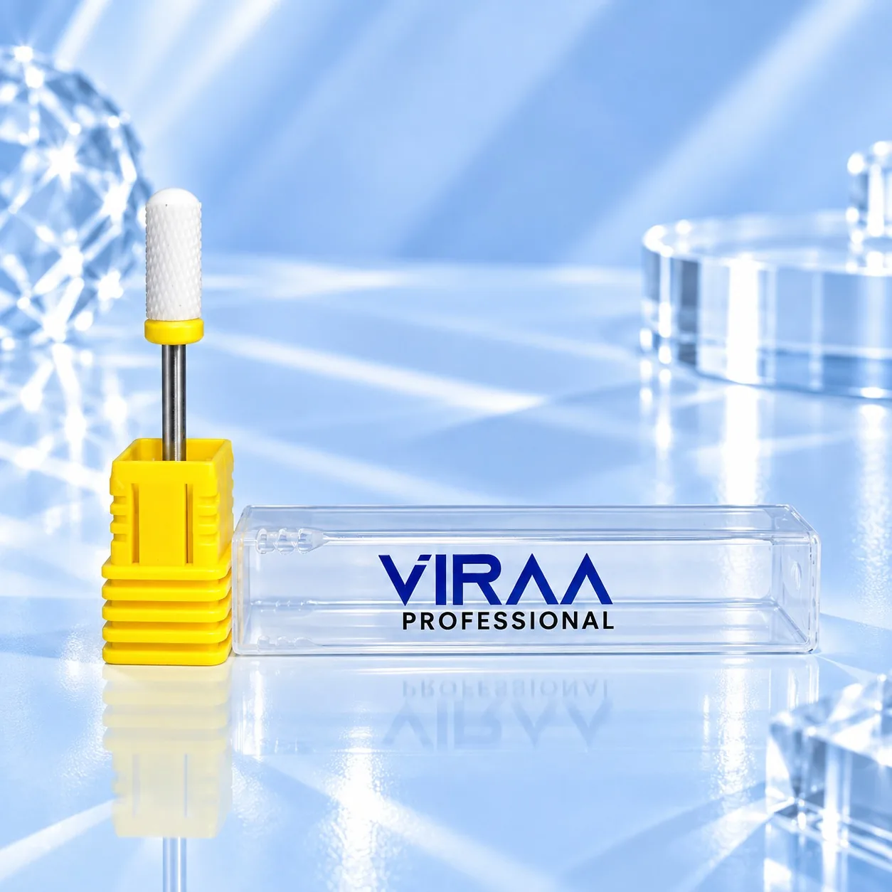 Viraa Pro nail drill bit, extra-fine barrel ball with a yellow grit band, beside its clear case