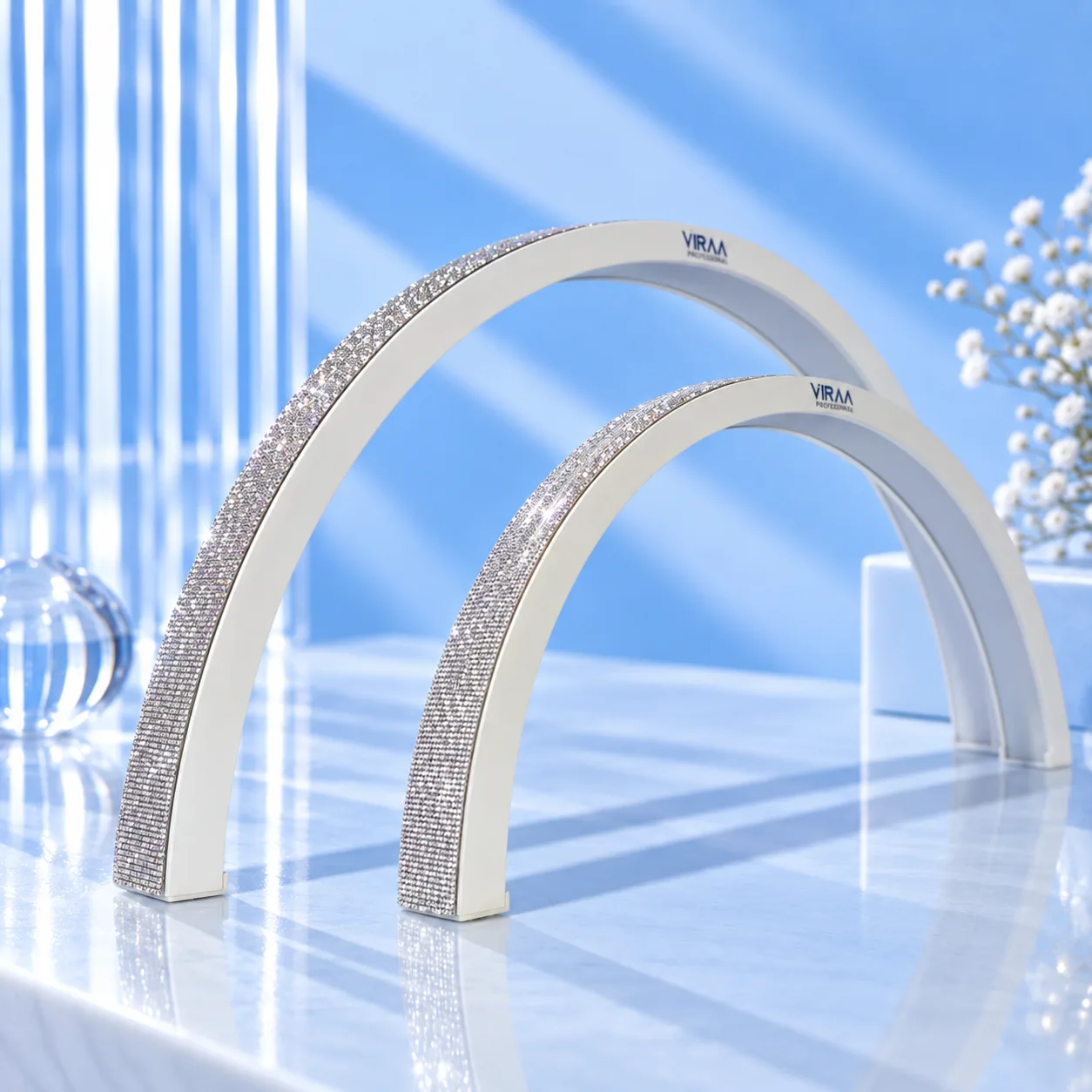 Two white moon-shaped nail table lamps with rhinestone edges, 75cm and 57cm, side by side