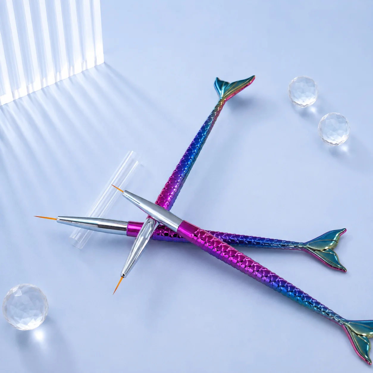 VIRAA nail art liner brushes with iridescent mermaid-tail handles, fine striping bristles and a clear protective cap