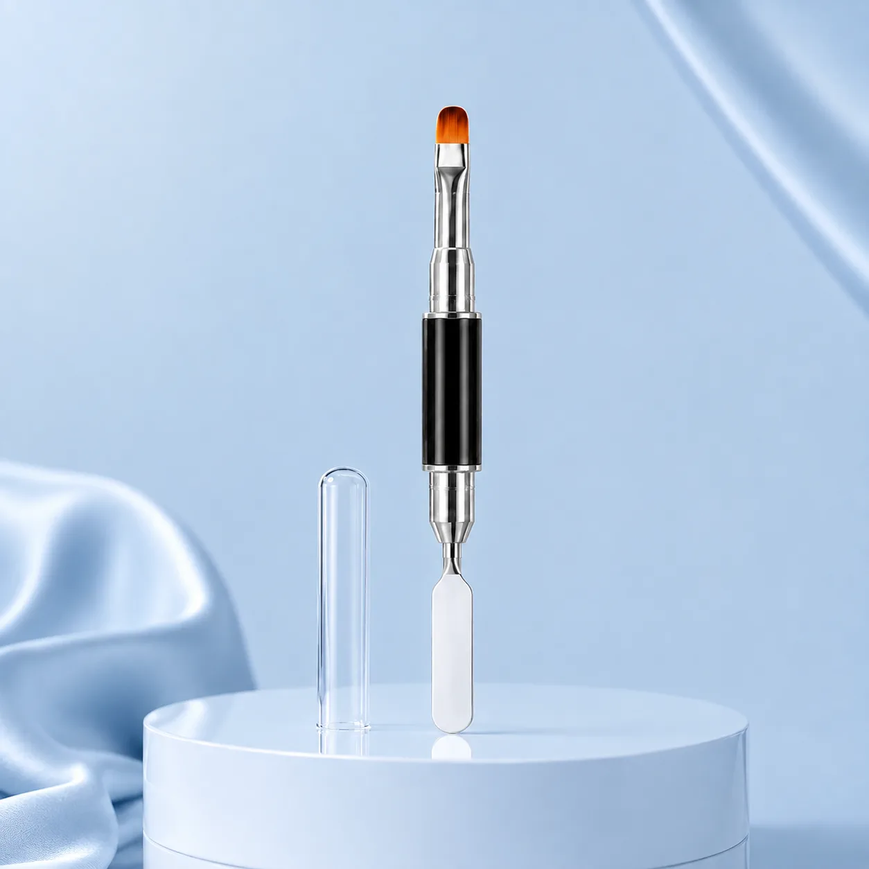 Dual-ended polygel brush and spatula with a black handle, with its clear cap