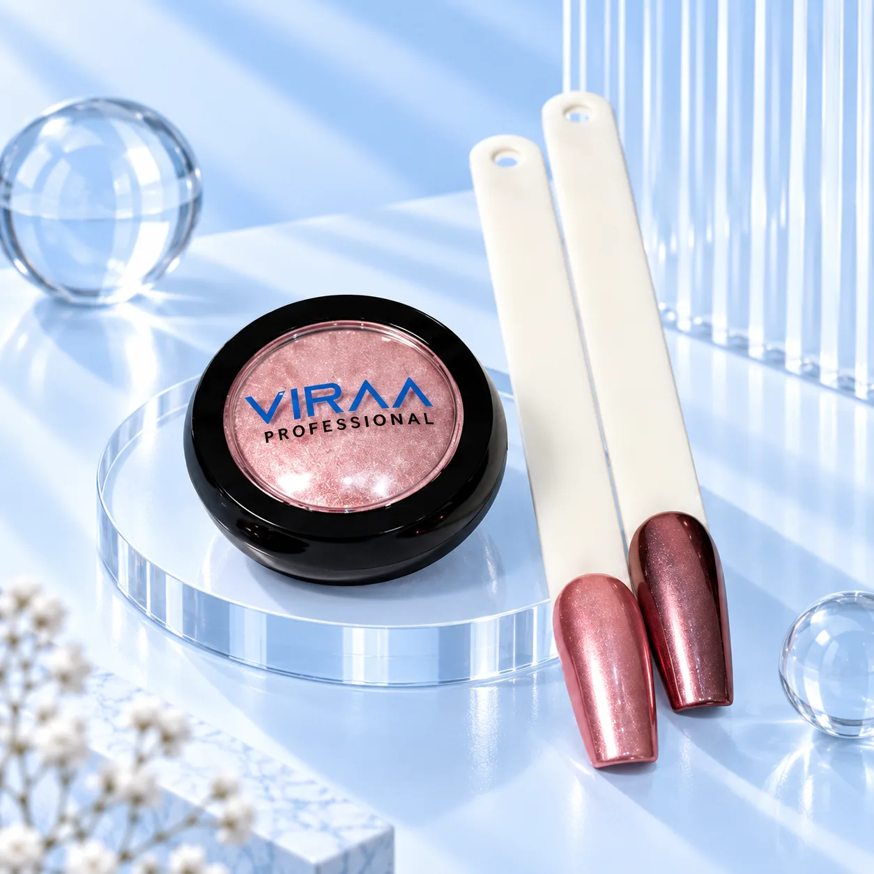 Viraa Pro Mirror Chrome Powder shade 003, a rose red powder, with a lighter and a darker sample nail tip