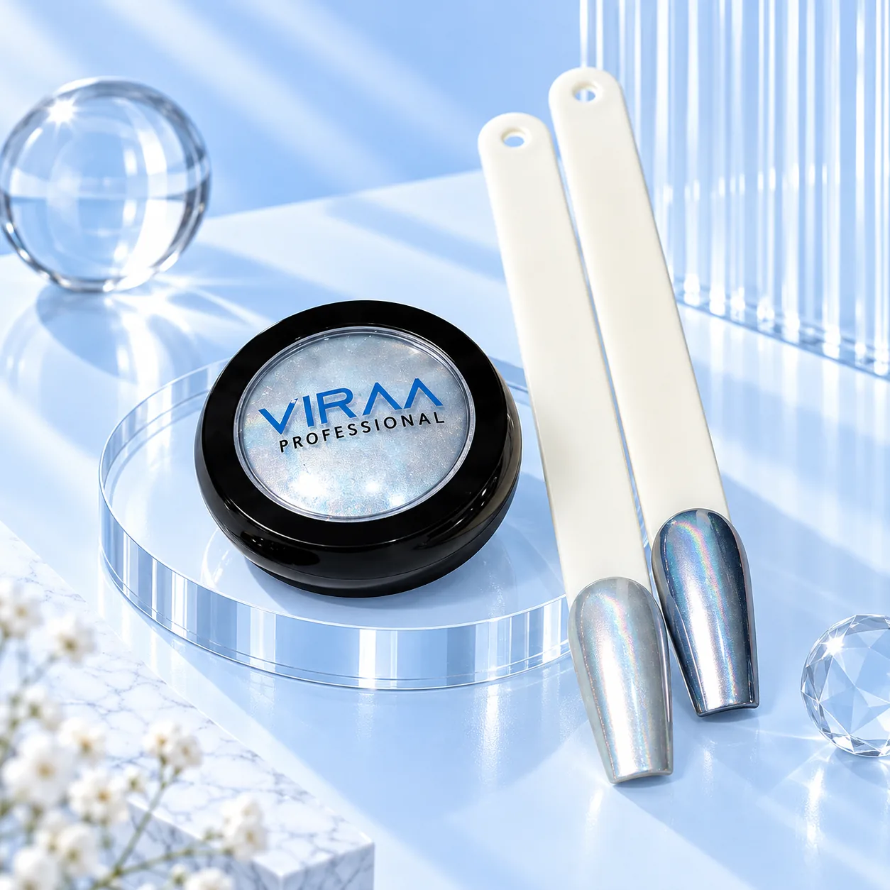 Viraa Pro Mirror Chrome Powder shade 004, a holographic silver powder, with a lighter and a darker sample nail tip