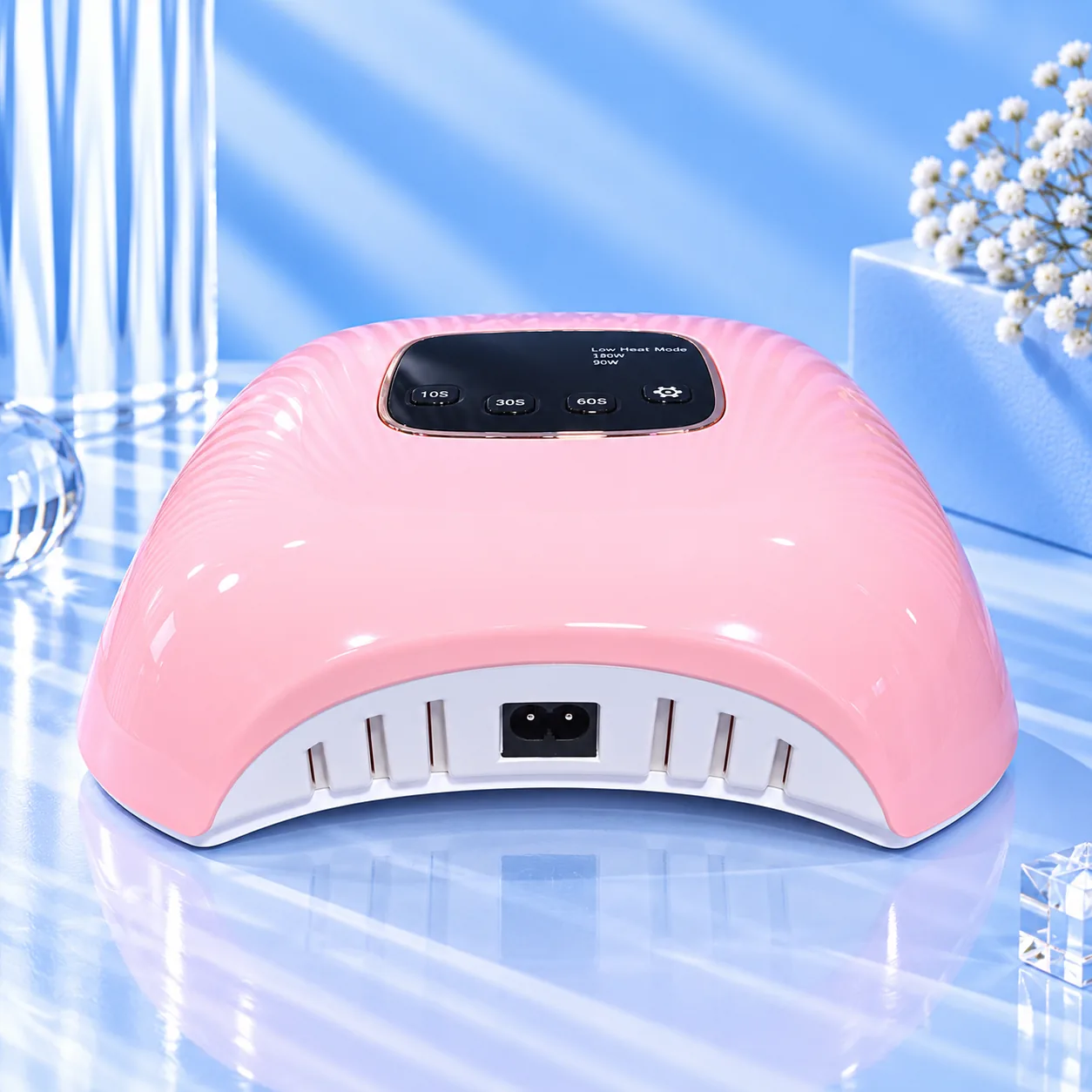 Back of the Viraa Pro Soft Delight pink nail lamp with its power socket and vents