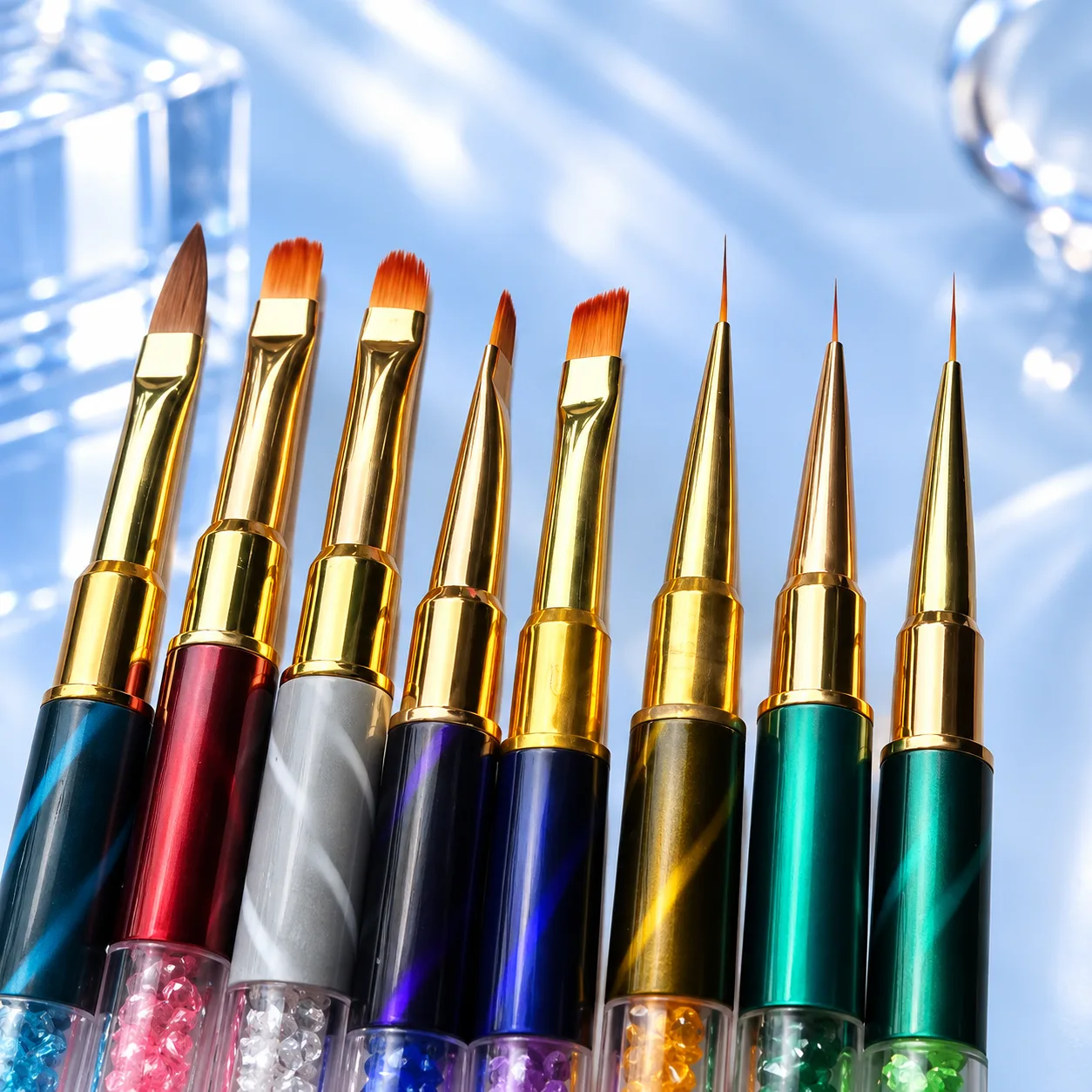 Close-up of the eight brush heads in the VIRAA Professional nail art brush set, from angled and flat brushes to fine liners