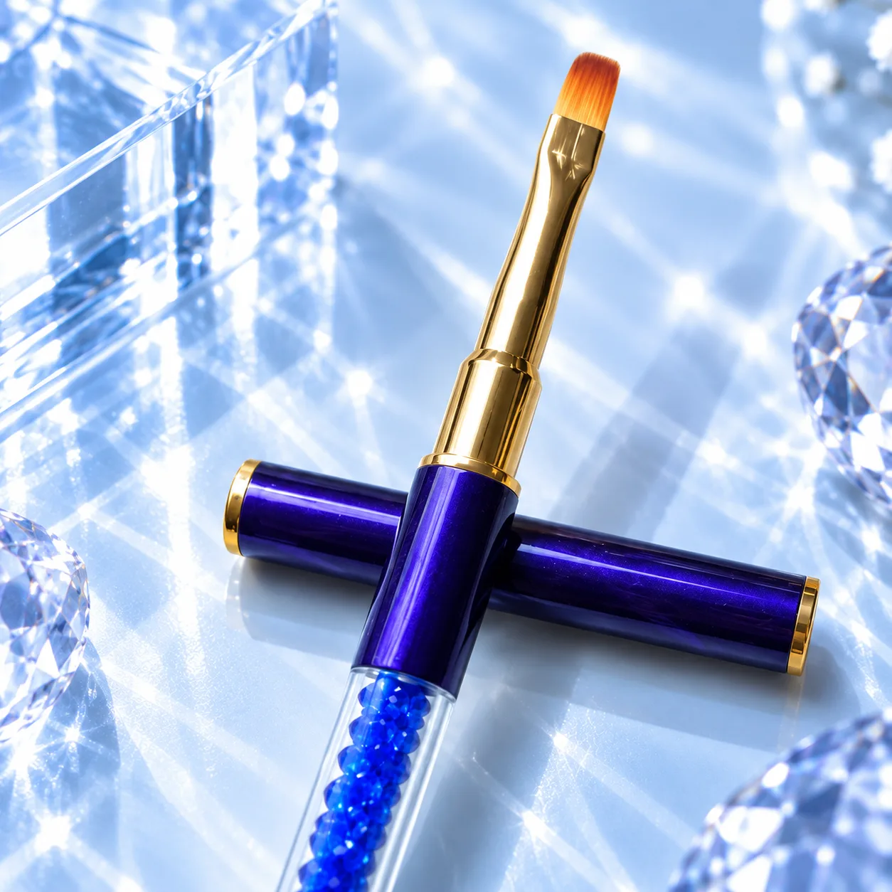 Flat brush from the VIRAA Professional 8pc nail art brush set, with a deep blue marbled barrel and a blue crystal handle