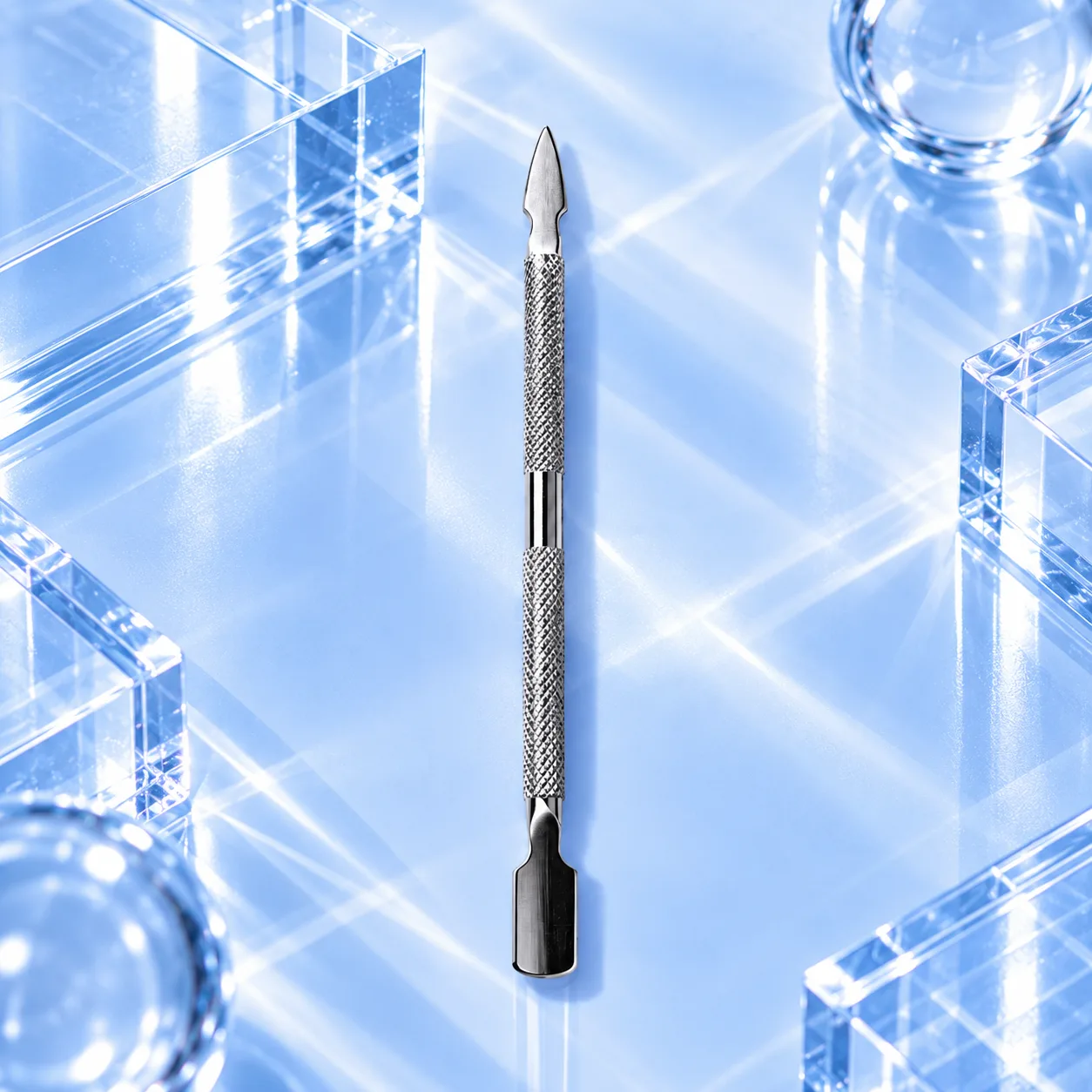 VIRAA Professional steel cuticle pusher, Style B, a double-ended tool with a textured grip and a pointed end